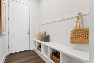 Experience elevated modern living in this 2019-built residence