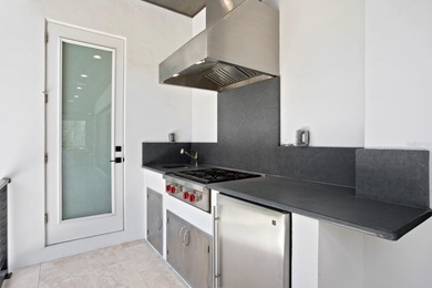 Experience elevated modern living in this 2019-built residence