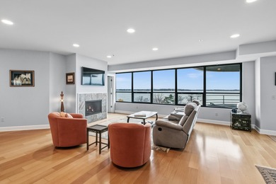 Lake facing modern condominium offering combination of downtown