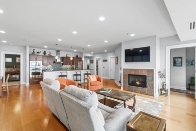 Lake facing modern condominium offering combination of downtown