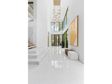 A statement of modern waterfront luxury, 24 Fiesta Way