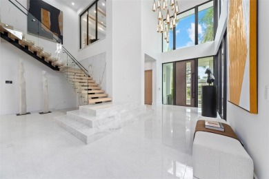 A statement of modern waterfront luxury, 24 Fiesta Way