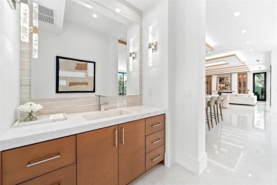 A statement of modern waterfront luxury, 24 Fiesta Way