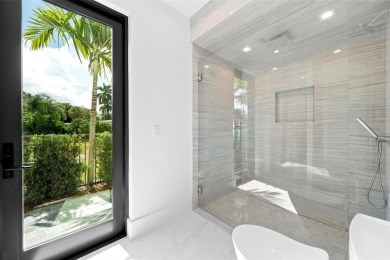 A statement of modern waterfront luxury, 24 Fiesta Way