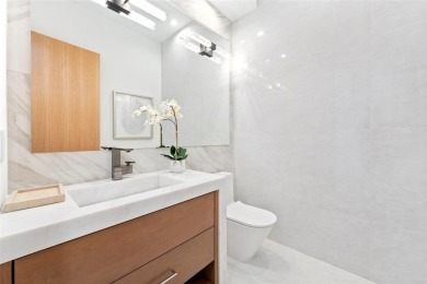 A statement of modern waterfront luxury, 24 Fiesta Way