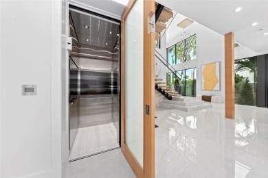 A statement of modern waterfront luxury, 24 Fiesta Way