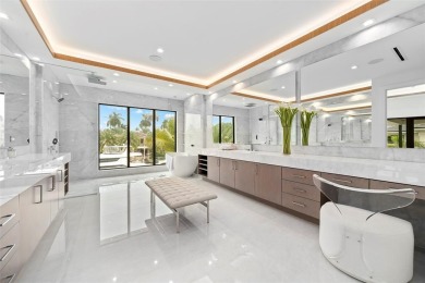 A statement of modern waterfront luxury, 24 Fiesta Way