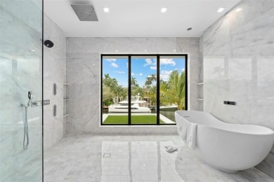 A statement of modern waterfront luxury, 24 Fiesta Way