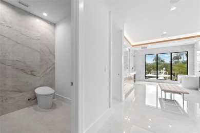 A statement of modern waterfront luxury, 24 Fiesta Way