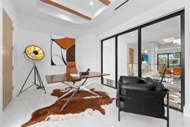 A statement of modern waterfront luxury, 24 Fiesta Way