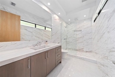 A statement of modern waterfront luxury, 24 Fiesta Way