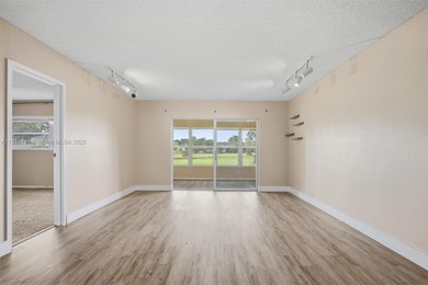 MOTIVATED SELLER! Spacious 2BR/2BA second-floor condo in the