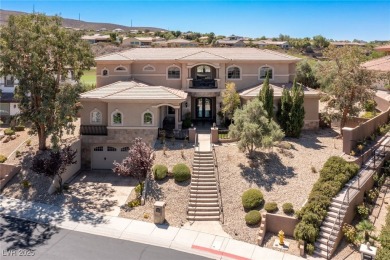 Wake up to panoramic golf course views at this custom home