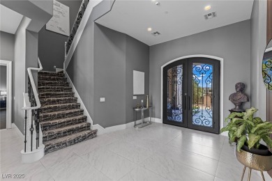 Wake up to panoramic golf course views at this custom home