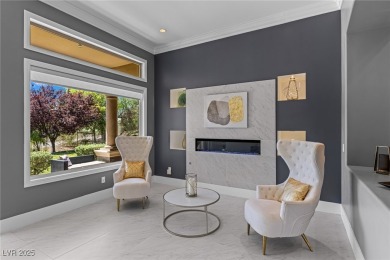 Wake up to panoramic golf course views at this custom home