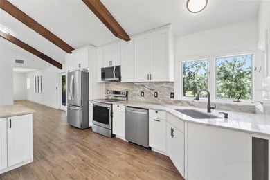 RIVERFRONT RETREAT on over 7 acres in Arcadia! Beautifully