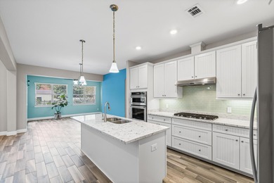 Welcome to this stunning nearly 3,000 sq. ft. all-brick home