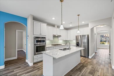 Welcome to this stunning nearly 3,000 sq. ft. all-brick home