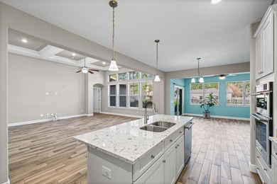 Welcome to this stunning nearly 3,000 sq. ft. all-brick home