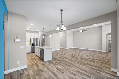 Welcome to this stunning nearly 3,000 sq. ft. all-brick home