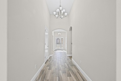 Welcome to this stunning nearly 3,000 sq. ft. all-brick home