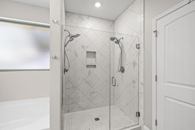 Welcome to this stunning nearly 3,000 sq. ft. all-brick home