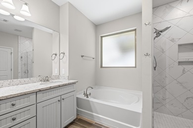 Welcome to this stunning nearly 3,000 sq. ft. all-brick home