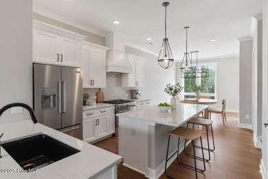 Experience exceptional coastal living in this stunning new