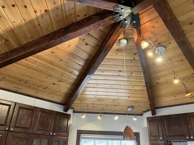 - 10.74 ac with 1,295 sq ft 2 bedroom custom house (officially 1