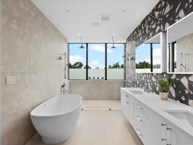 Newly built waterfront estate offering 70 feet of direct