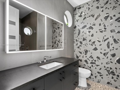 Newly built waterfront estate offering 70 feet of direct