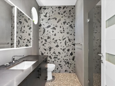 Newly built waterfront estate offering 70 feet of direct