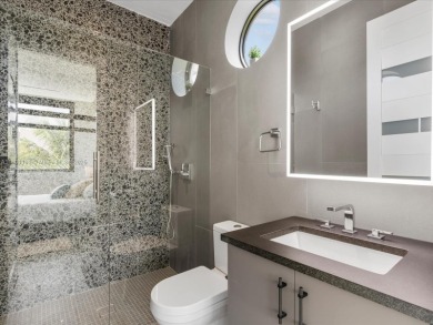 Newly built waterfront estate offering 70 feet of direct