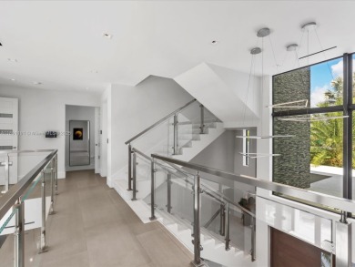 Newly built waterfront estate offering 70 feet of direct