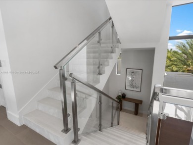 Newly built waterfront estate offering 70 feet of direct