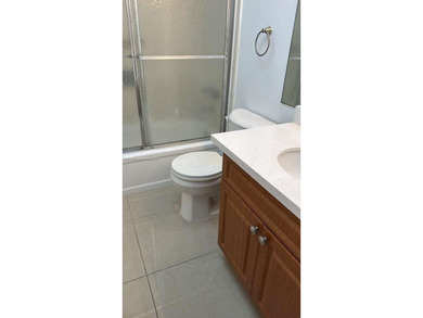 Beautiful 2BR/2BA Condo in 55+ Gated Community with Garden Views