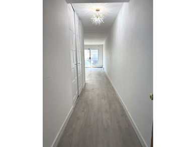 Spacious one-bedroom unit located in the Grove Towers. Long