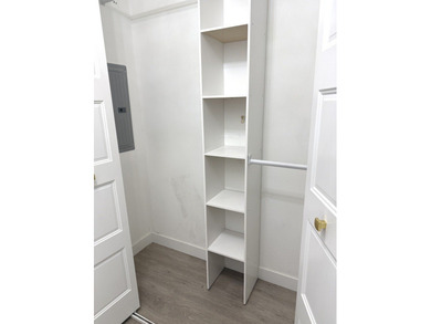 Spacious one-bedroom unit located in the Grove Towers. Long