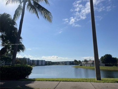 Resort-style corner unit with stunning lake views in the heart