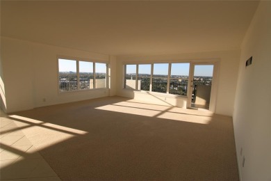 THIS SPACIOUS CORNER PENTHOUSE FEELS LIKE A HOME. SITTING ON A