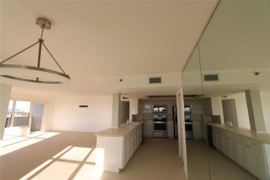 THIS SPACIOUS CORNER PENTHOUSE FEELS LIKE A HOME. SITTING ON A