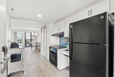 Experience luxury coastal living in this fully renovated