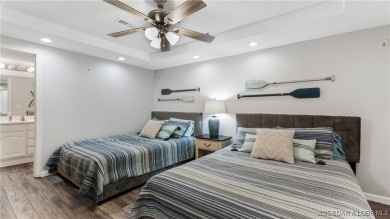 Enjoy incredible lake views from this spacious 4-bedroom, 3-bath