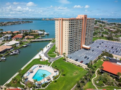 Looking for a home with a panoramic view of Boca Ciega Bay? LOOK