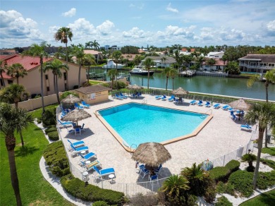 Looking for a home with a panoramic view of Boca Ciega Bay? LOOK