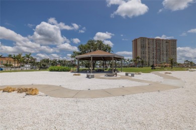 Looking for a home with a panoramic view of Boca Ciega Bay? LOOK