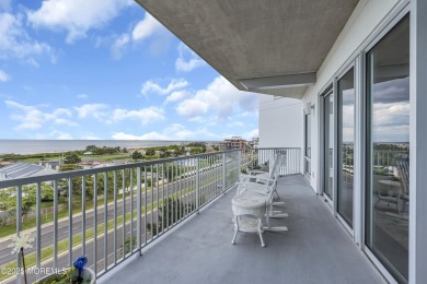 PANORAMIC OCEAN VIEWS! Welcome to luxury coastal living in this