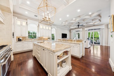 Elegant  2-story residence sited on private lushly-landscaped