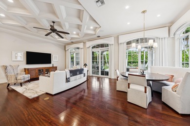 Elegant  2-story residence sited on private lushly-landscaped