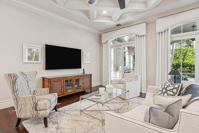 Elegant  2-story residence sited on private lushly-landscaped